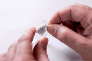 CILS Barcode Labels being applied to microscope slide